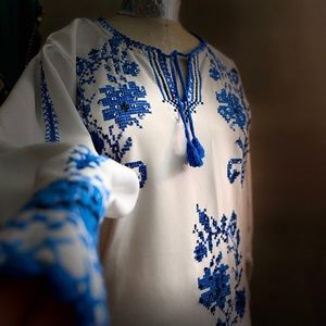 Blue threadsOnWhite fabric-size 2 Handmade by palestinian artist#TheTaleOfAThoub